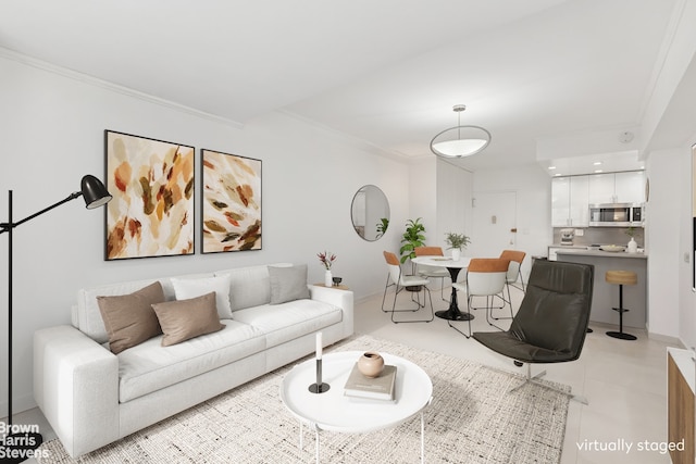 living room featuring crown molding