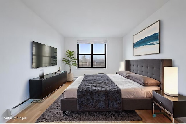 bedroom featuring light wood-type flooring