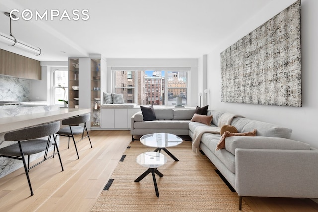 living room featuring light wood-style flooring