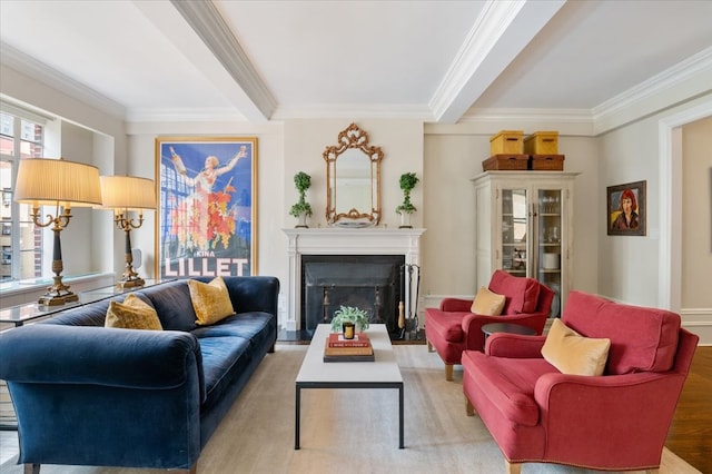 living area featuring light wood finished floors, a fireplace, and ornamental molding