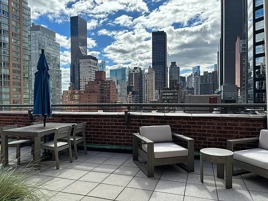 view of patio / terrace featuring a city view