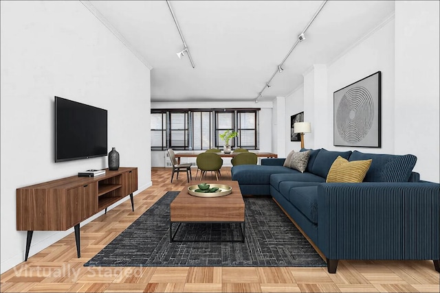 living room with baseboards and track lighting