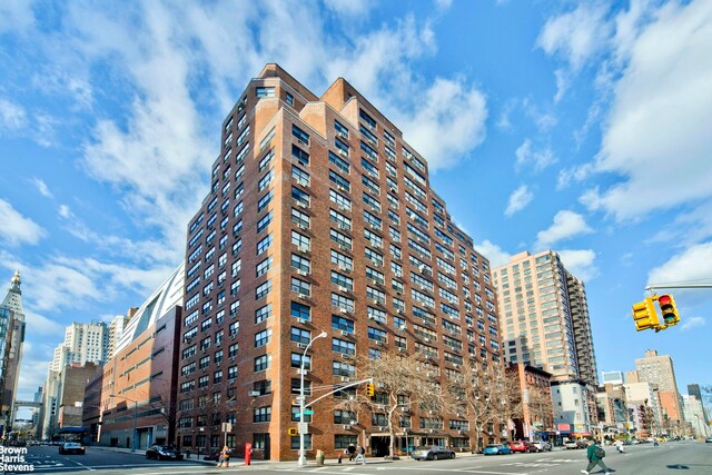 view of building exterior with a view of city