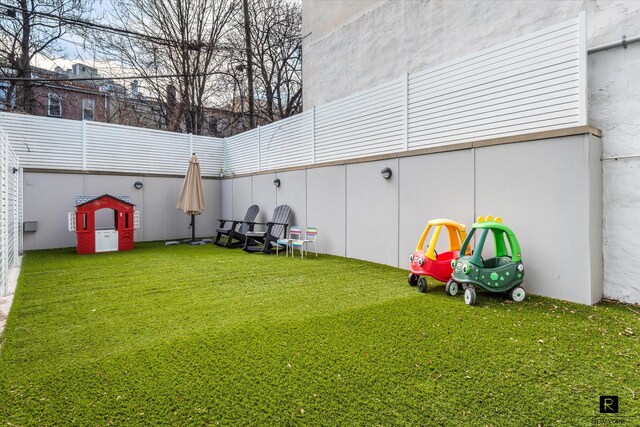 view of yard with fence