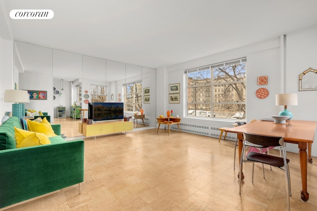 living room with radiator heating unit and visible vents