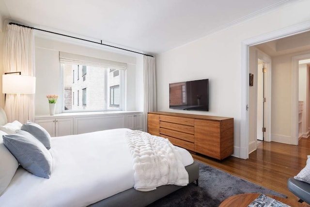 530 Park Ave Unit 5A, New York City, NY 10065 - bedroom with baseboards and wood finished floors