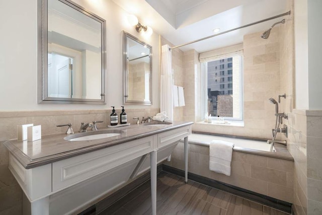 530 Park Ave Unit 5A, New York City, NY 10065 - bathroom featuring a sink, tile walls, double vanity, and wood finished floors