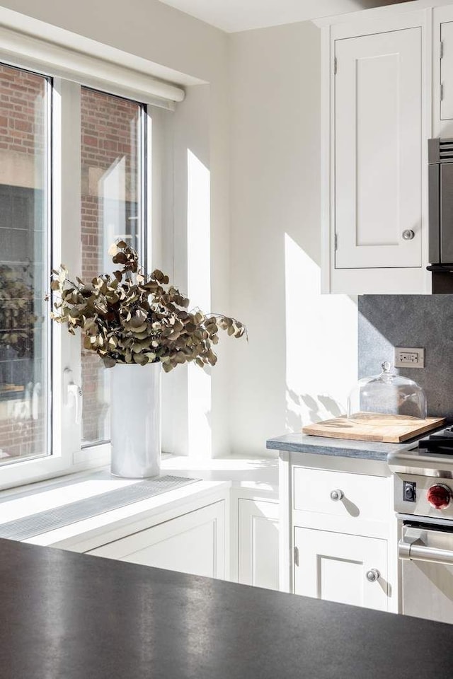 530 Park Ave Unit 5A, New York City, NY 10065 - room details with stainless steel range and white cabinets