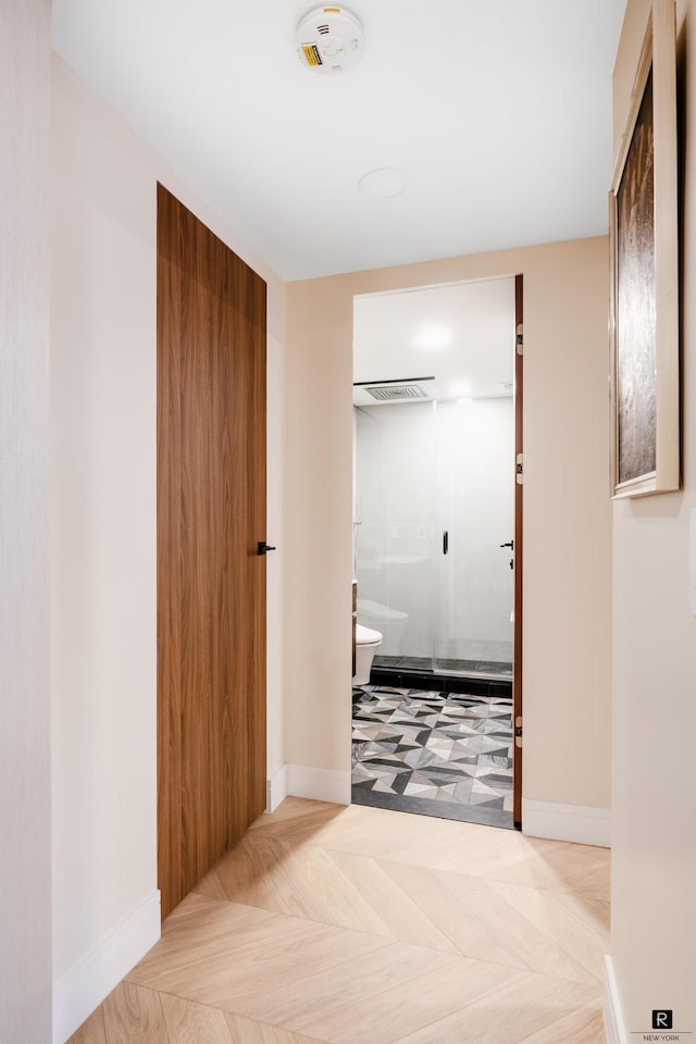 225 E 57th St Unit 18-G, New York City, NY 10022 - hallway with baseboards