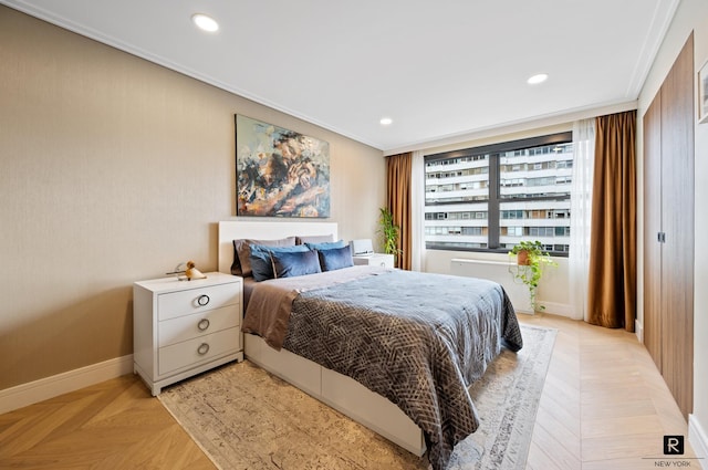 bedroom featuring baseboards, recessed lighting, and crown molding