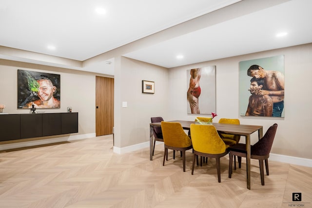 dining area featuring recessed lighting and baseboards