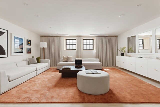 living room featuring plenty of natural light