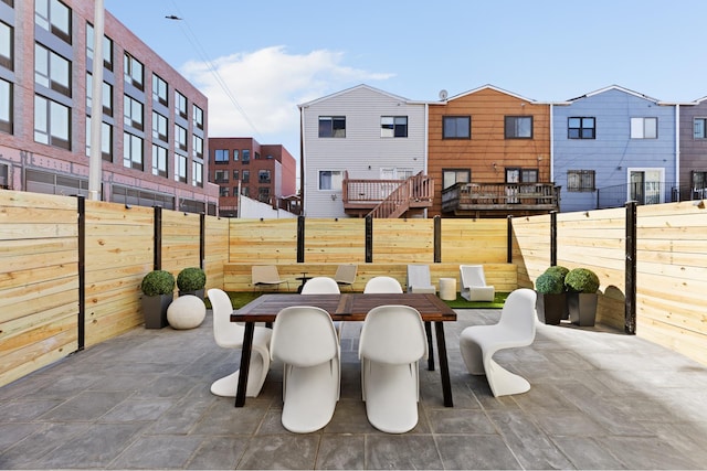 view of patio / terrace with outdoor dining area and a fenced backyard