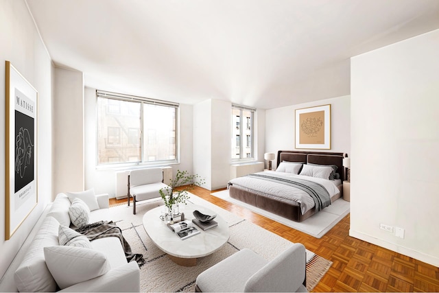 bedroom featuring baseboards