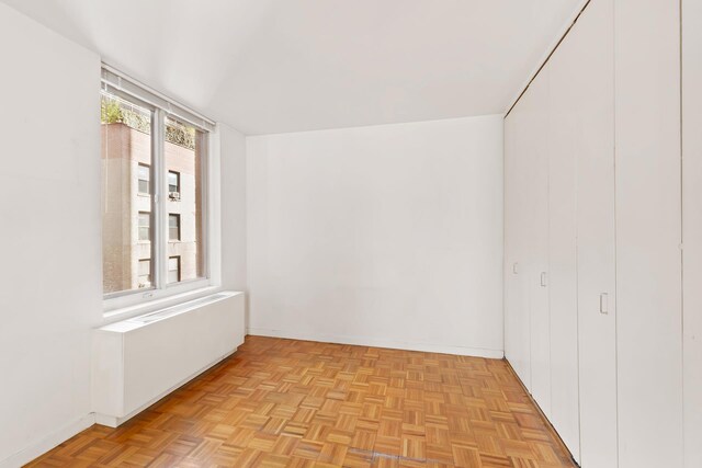 145 E 48th St Unit 8B, New York City, NY 10017 - spare room featuring baseboards