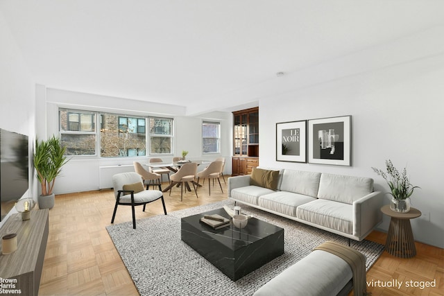 living room featuring plenty of natural light