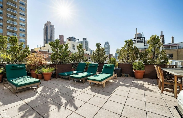 view of patio with a view of city