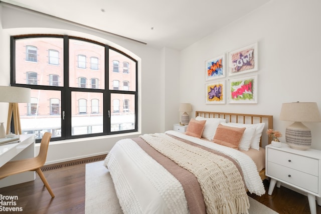 bedroom featuring wood finished floors