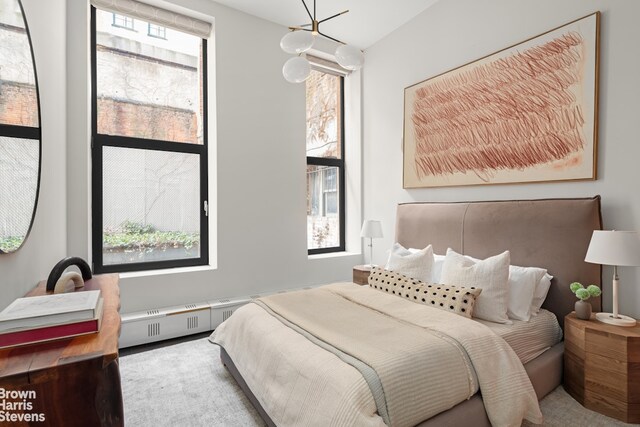 bedroom featuring a baseboard radiator