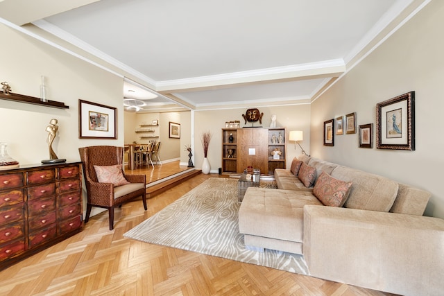 living room featuring ornamental molding and baseboards