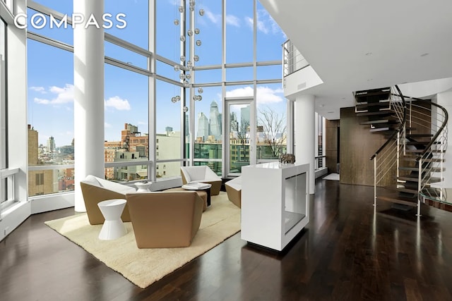 sunroom featuring a view of city