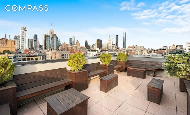 view of patio / terrace featuring a view of city