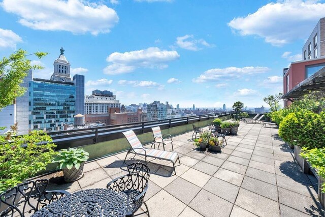 view of patio with a city view