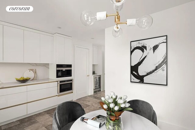 dining room with beverage cooler and visible vents