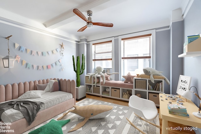 living room featuring beam ceiling, ornamental molding, ceiling fan, and wood finished floors