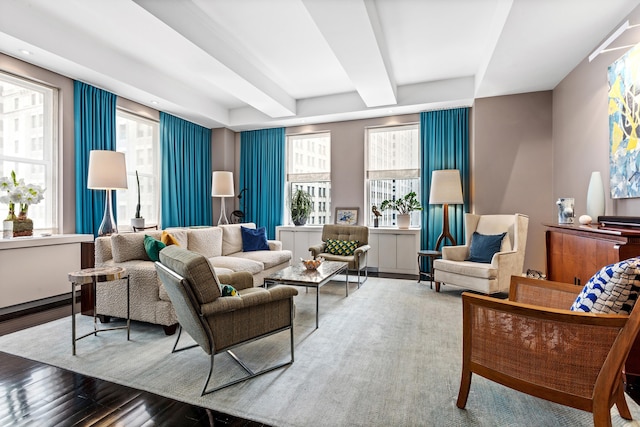 living area with beamed ceiling, plenty of natural light, wood finished floors, and recessed lighting