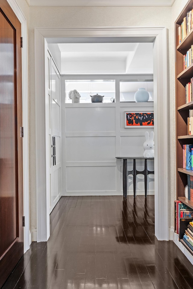 hallway featuring dark wood-style floors