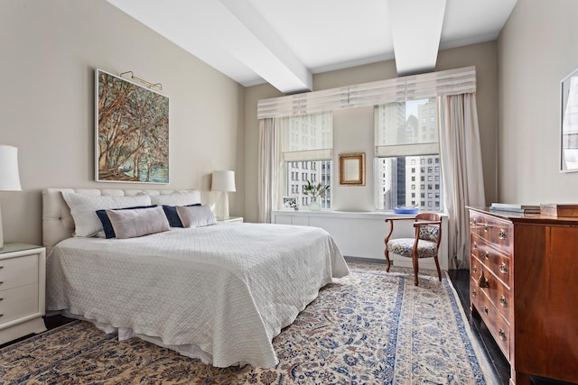 bedroom featuring beam ceiling