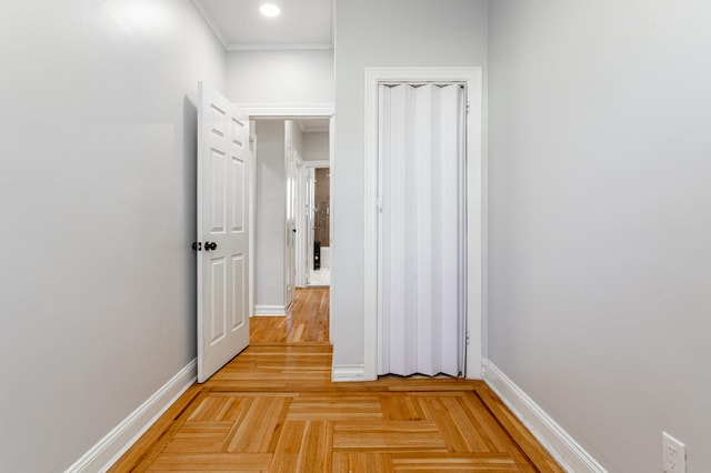 hallway with recessed lighting and baseboards