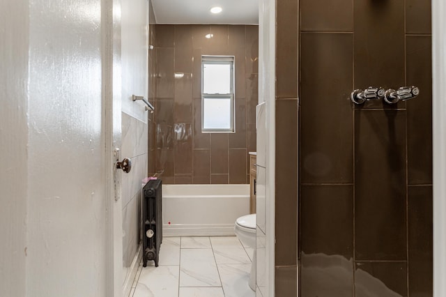 full bath with toilet and marble finish floor