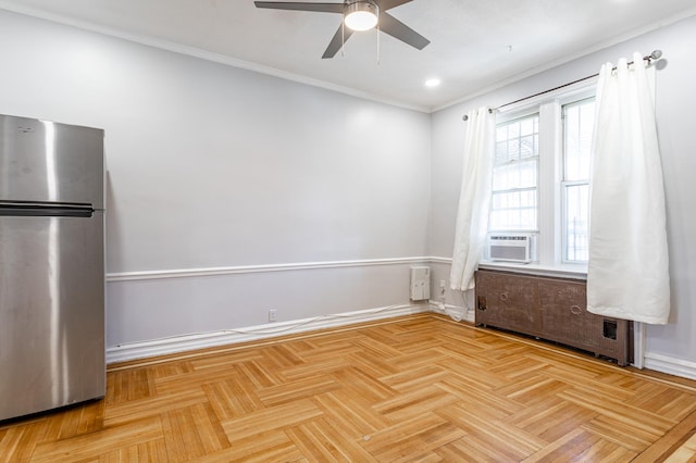 interior space with crown molding, radiator heating unit, baseboards, and ceiling fan