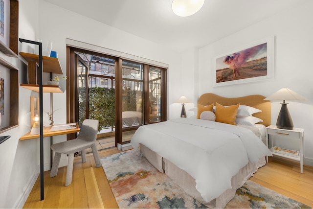 230 E 20th St Unit 13, New York City, NY 10003 - bedroom with wood finished floors and baseboards