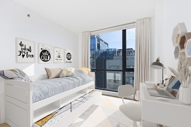 bedroom featuring wood finished floors