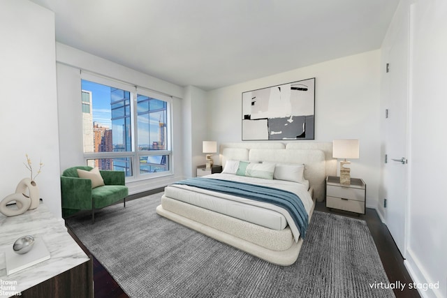 bedroom featuring wood finished floors