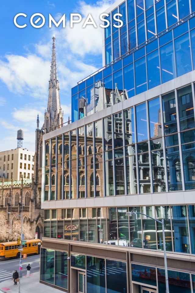 view of building exterior featuring a city view