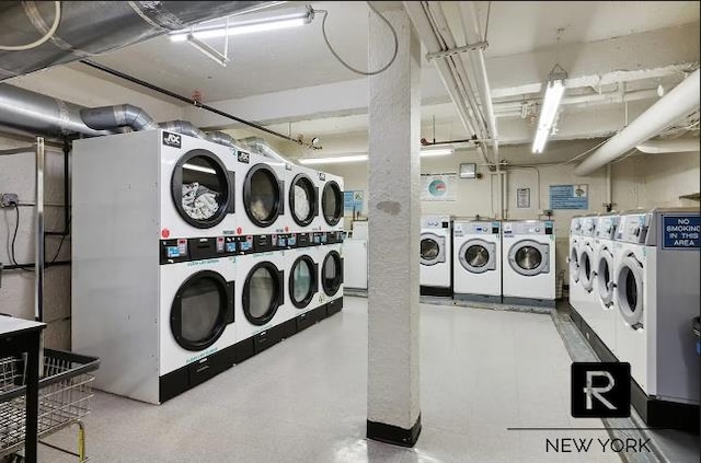 community laundry room featuring washer and clothes dryer