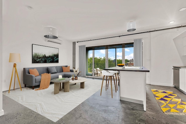 living area featuring recessed lighting, baseboards, concrete floors, and a wall mounted air conditioner