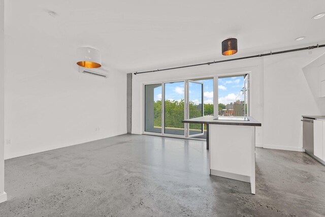 651 New York Ave Unit 502, New York City, NY 11203 - unfurnished living room with concrete floors and recessed lighting