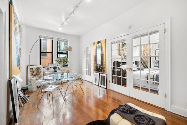131 E 29th St, New York City, NY 10016 - home office with rail lighting, french doors, and wood finished floors