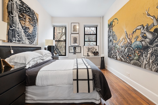 131 E 29th St, New York City, NY 10016 - bedroom featuring wood finished floors and baseboards