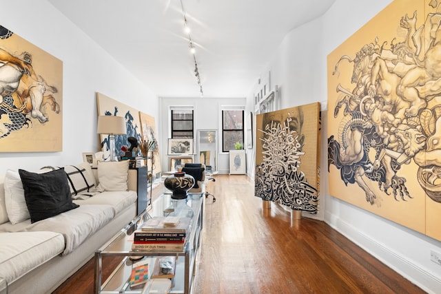 131 E 29th St, New York City, NY 10016 - living area with rail lighting and wood finished floors