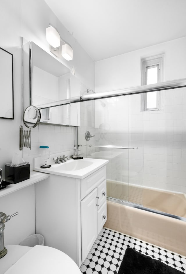 131 E 29th St, New York City, NY 10016 - full bathroom with enclosed tub / shower combo and vanity
