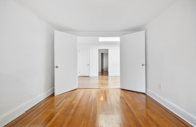 131 E 29th St, New York City, NY 10016 - empty room with light wood-type flooring and baseboards