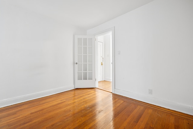 131 E 29th St, New York City, NY 10016 - empty room with wood finished floors and baseboards