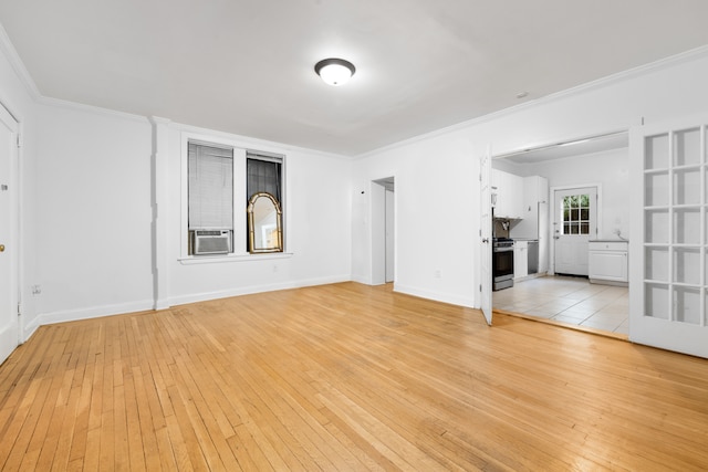 131 E 29th St, New York City, NY 10016 - unfurnished living room with light wood-style floors, crown molding, and cooling unit
