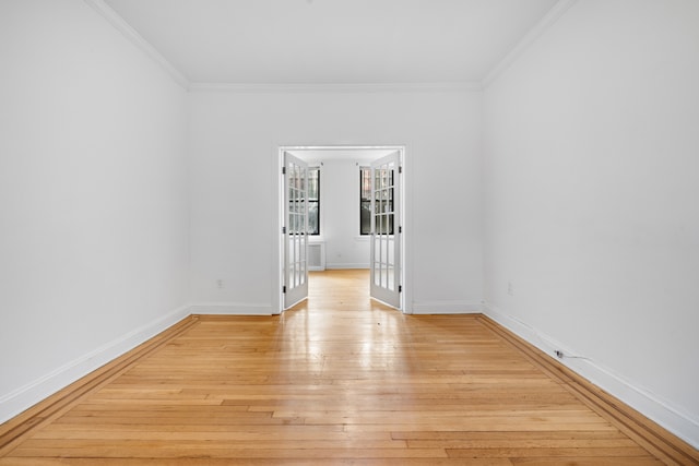 131 E 29th St, New York City, NY 10016 - empty room featuring light wood finished floors and ornamental molding